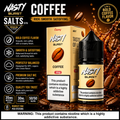 Nasty Burst Salts Coffee e-liquid packaging and bottle on a dark coffee-splash background, with product details, flavor text, and warning labels visible.